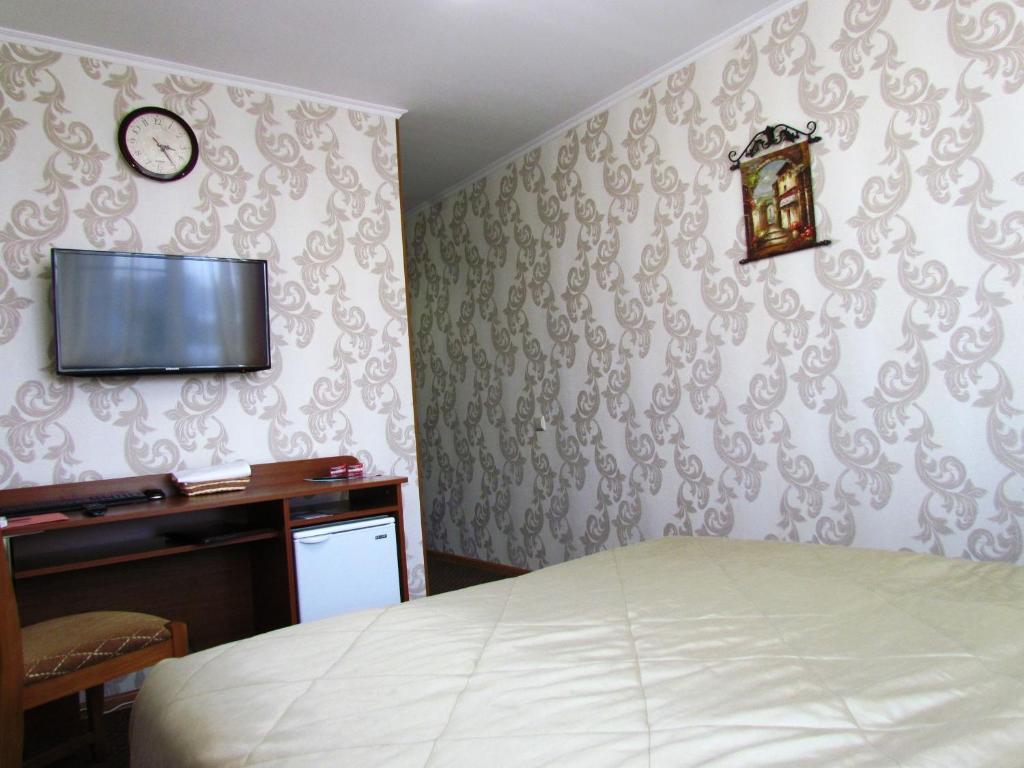 Paradise Hotel Gomel Pokoj fotografie